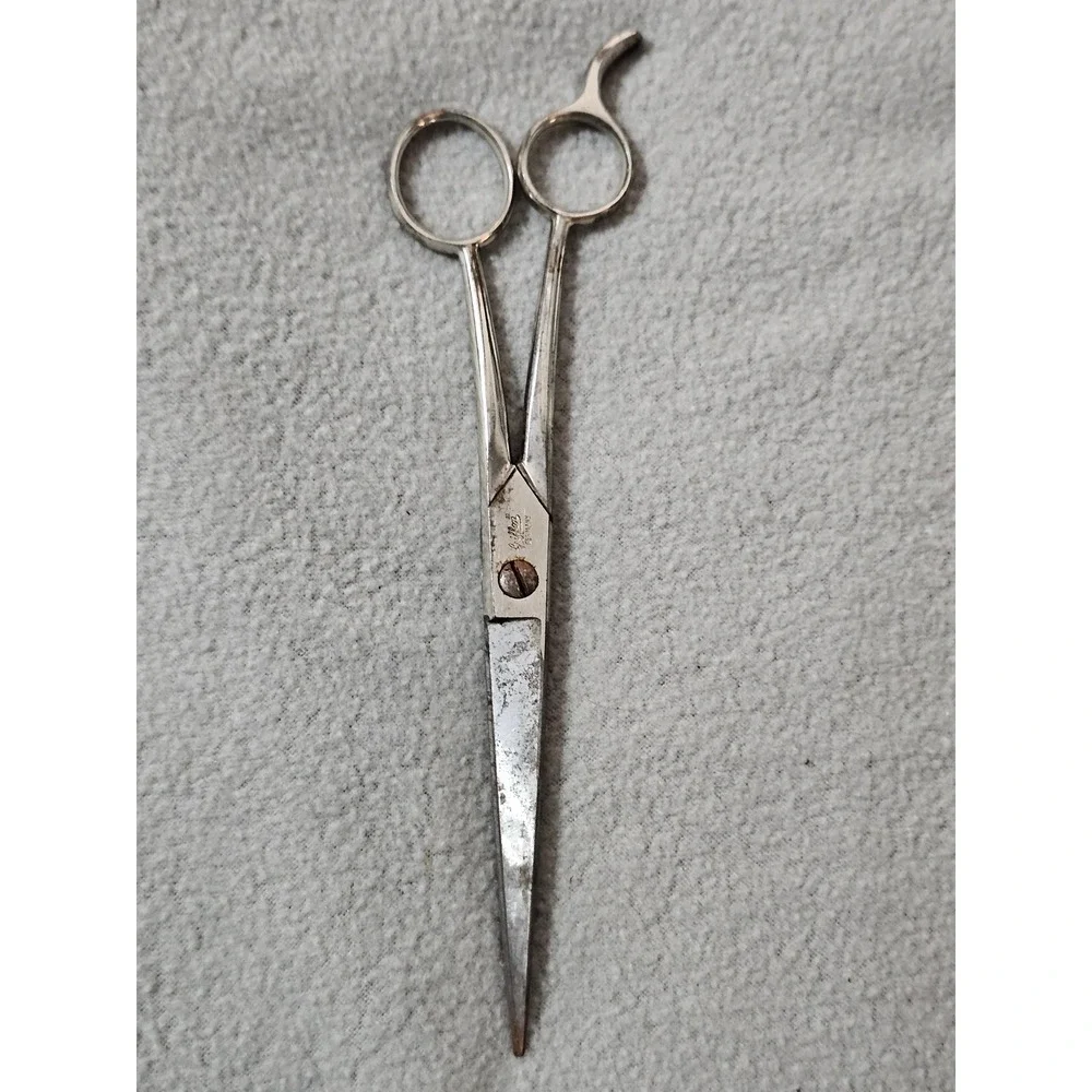 vintage silver metal hair scissors manufactured by Griffon in Germany collect